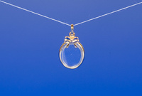 medallion 18K, oval bow